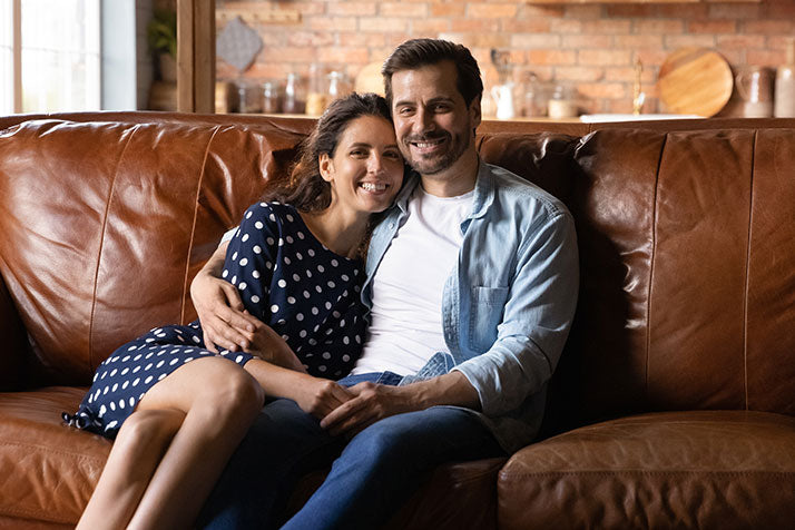 Couple on leather couch